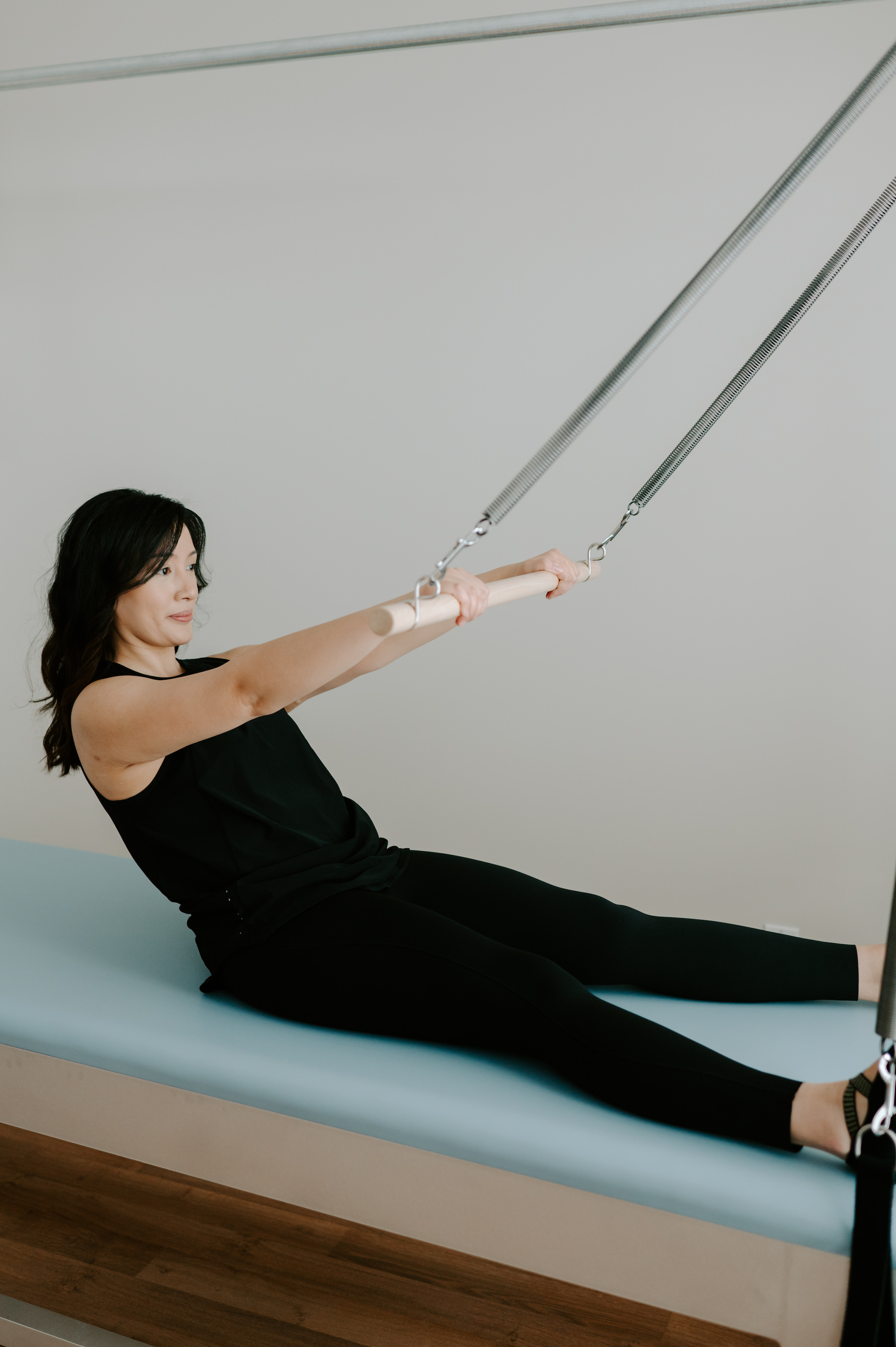 Roll Back Exercise on Pilates Cadillac